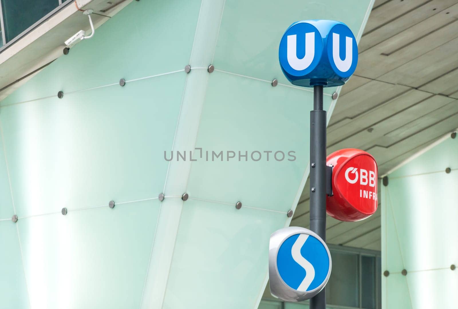Transportation hub station in Vienna, Austria. Three signs of different public transport systems. Europe travel.