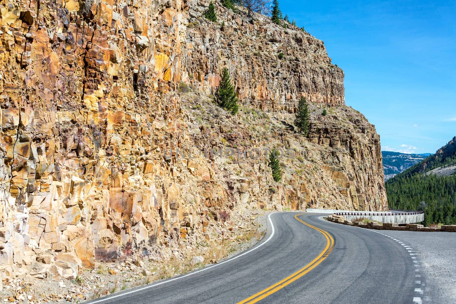 Road passing through a dramatic canyon near Mammoth Hot Springs in Yellowstone National Park