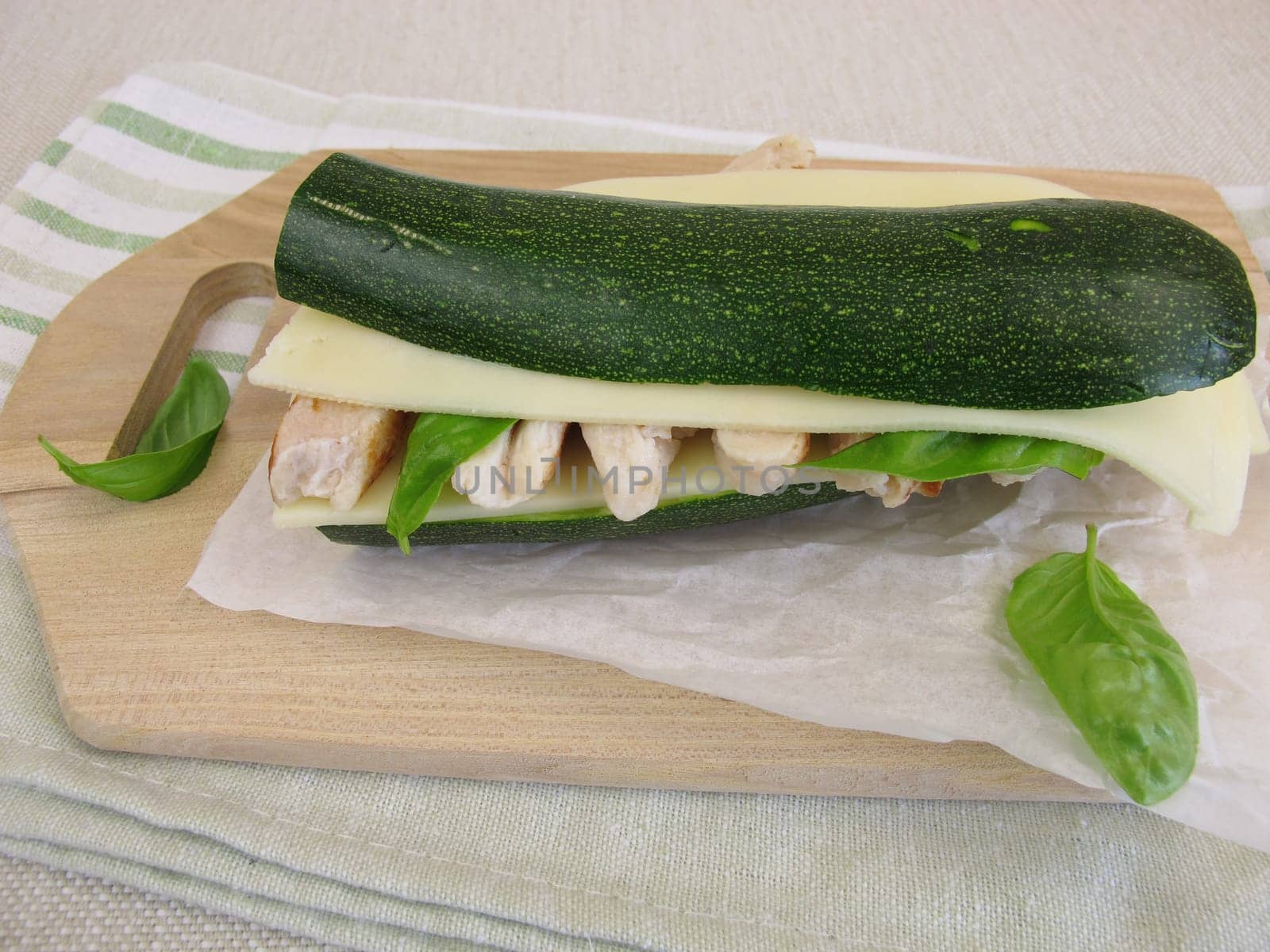 Low carb vegetable sandwich without bread with zucchini,cheese and chicken