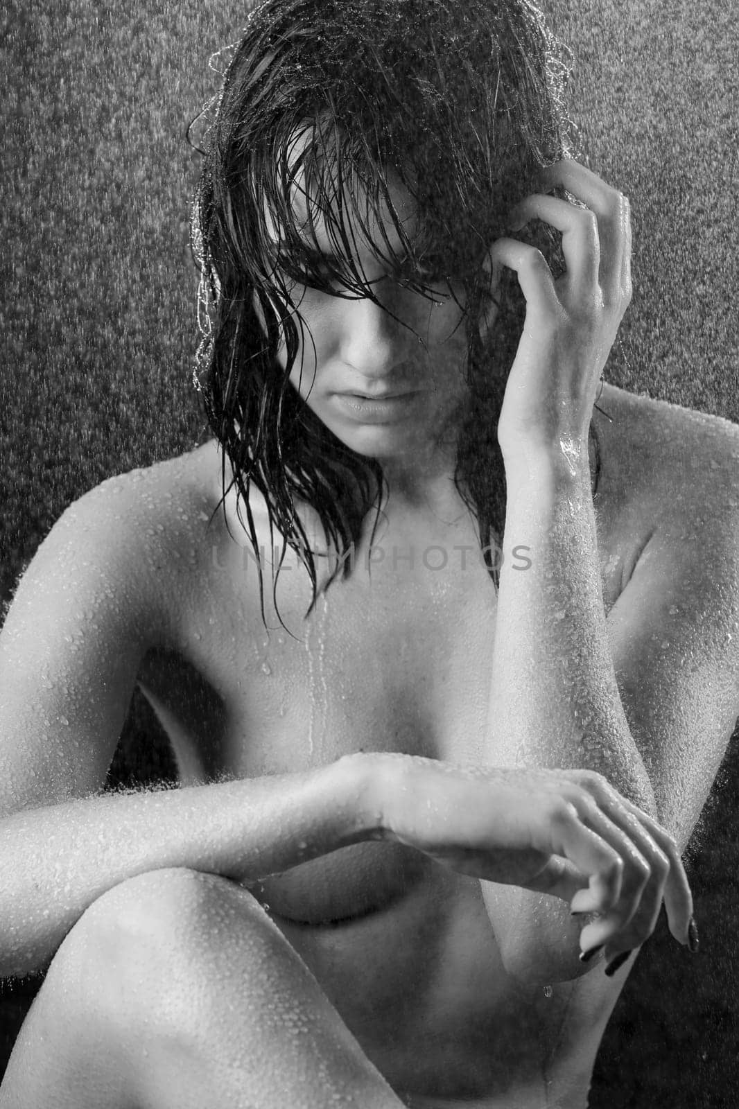 image of a sexy adult nude woman in provocative attitude under the water