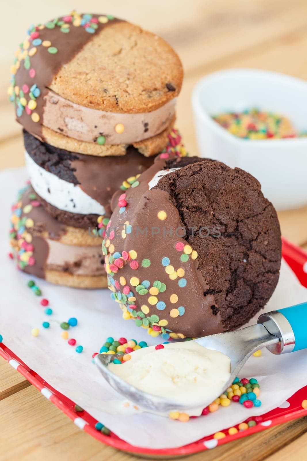 Ice cream sandwich with colorful sprinkles and chocolate