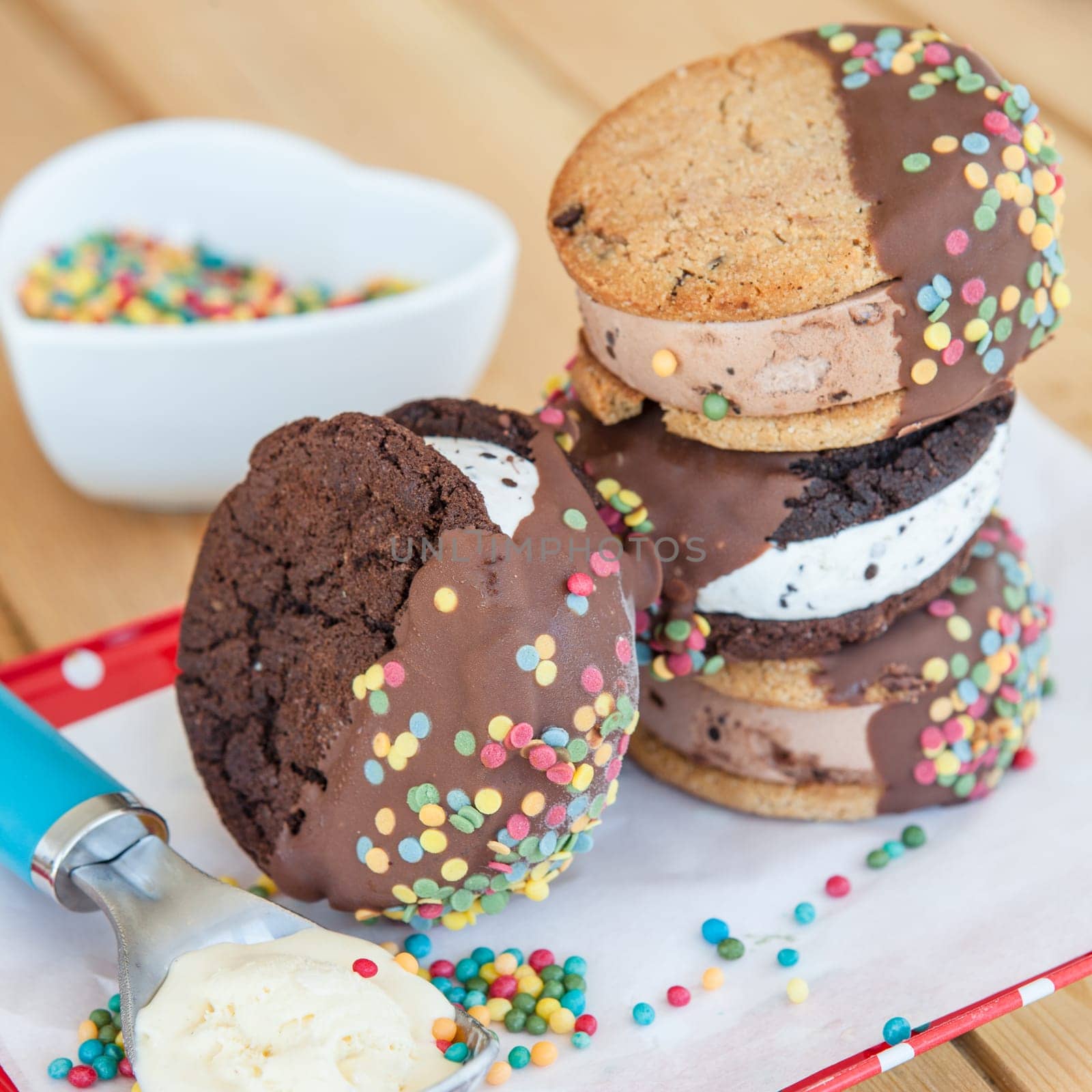 Ice cream sandwich with colorful sprinkles and chocolate