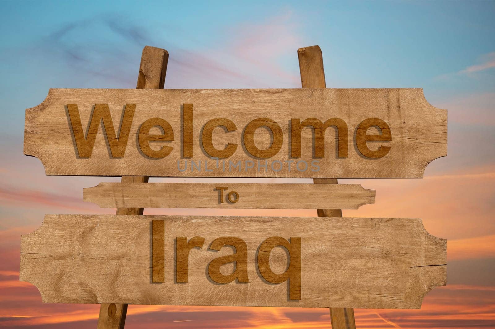 welcome to iraq sing on wood background