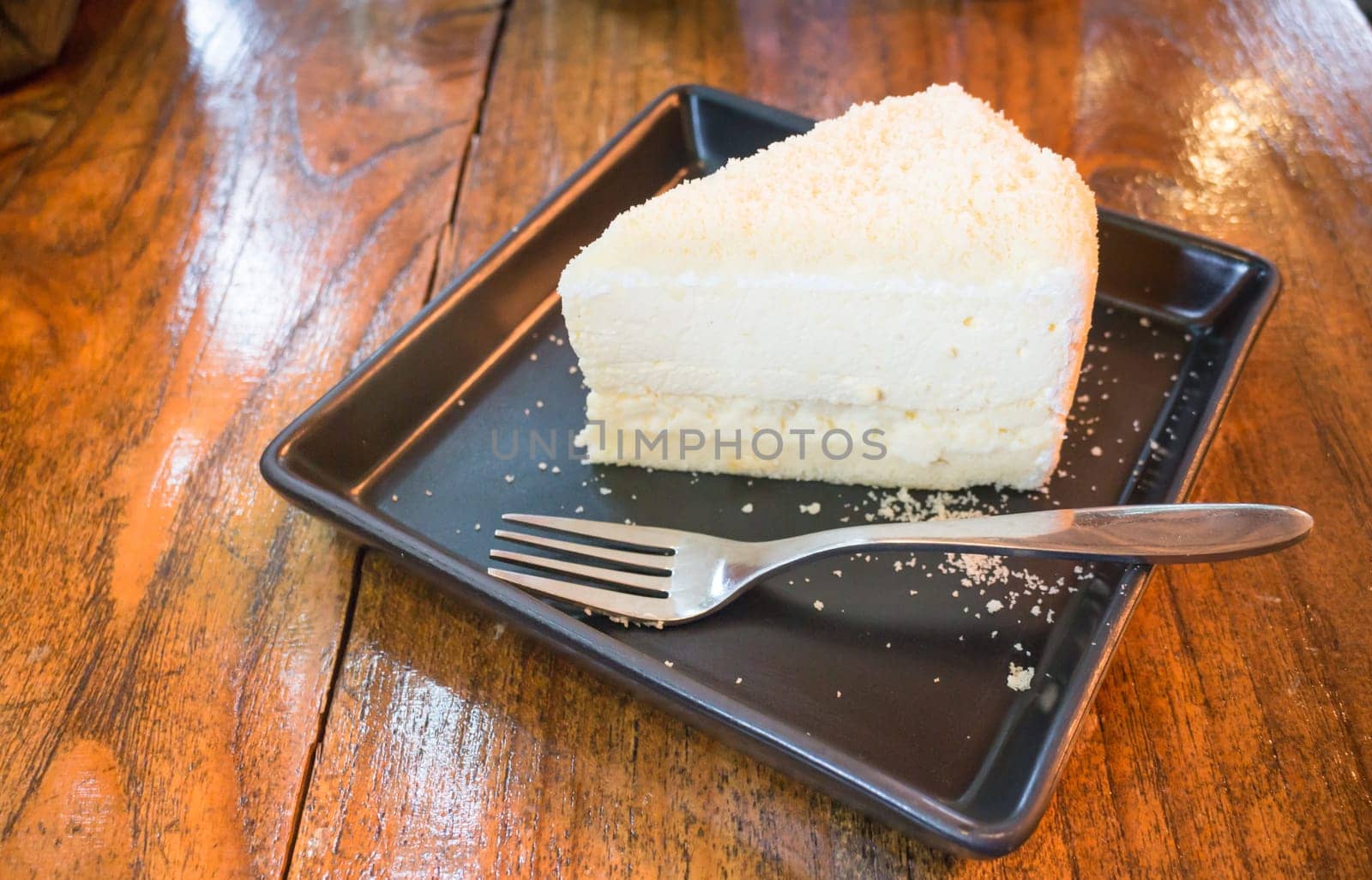 Piece of homemade cheese cake, stock photo
