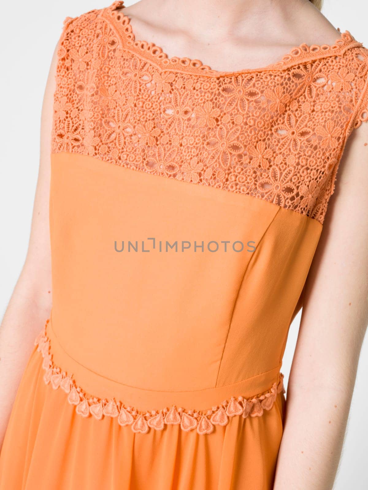 a beautiful model wearing feminine clothes in clear background