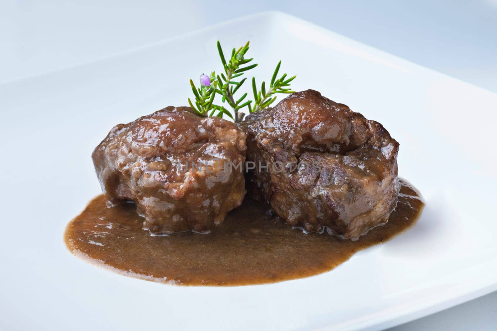 delicious traditional recipe from spain with beef tail and sauce
