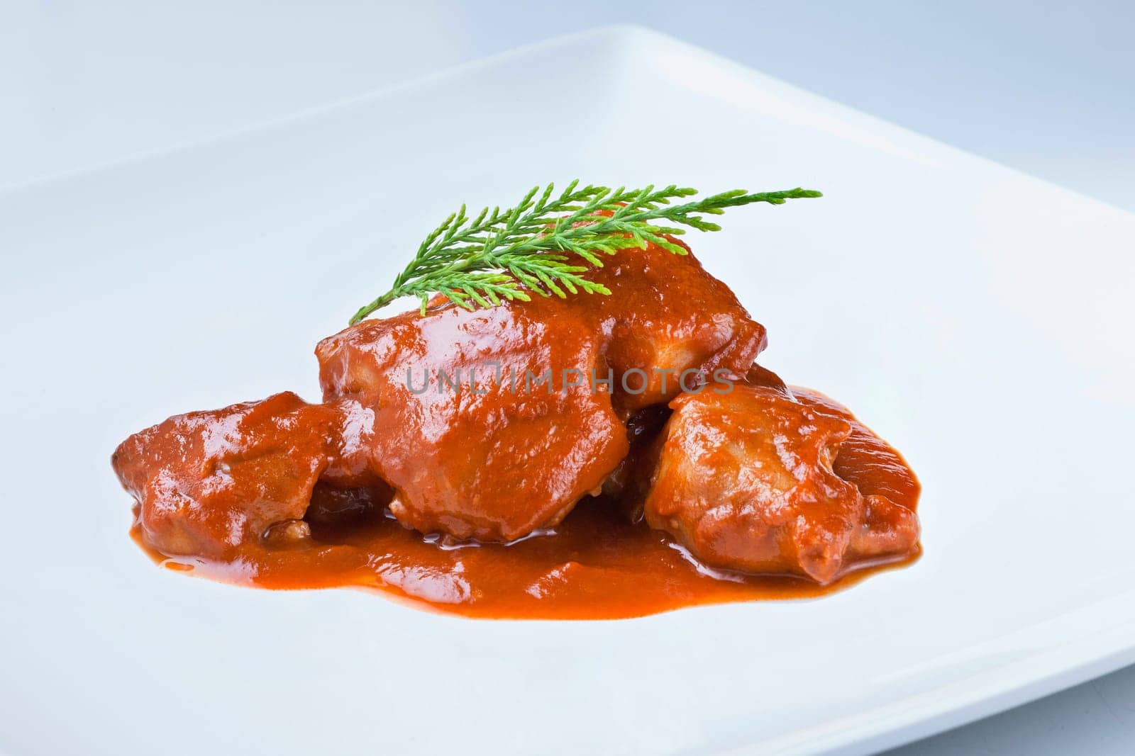 traditional recipe from spain with sauce called manitas de cerdo