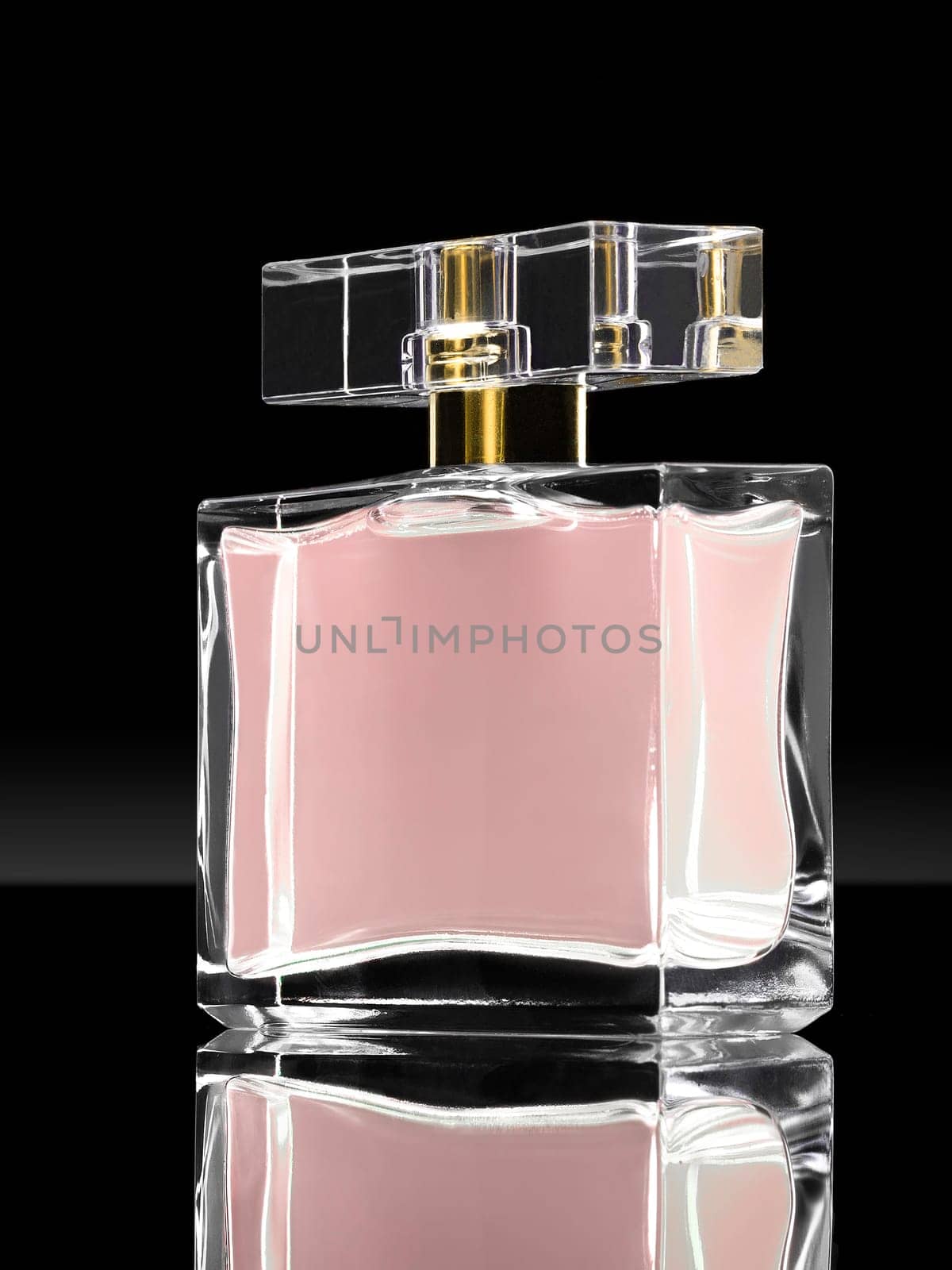 dark image of cosmetics fragrances in cristal container