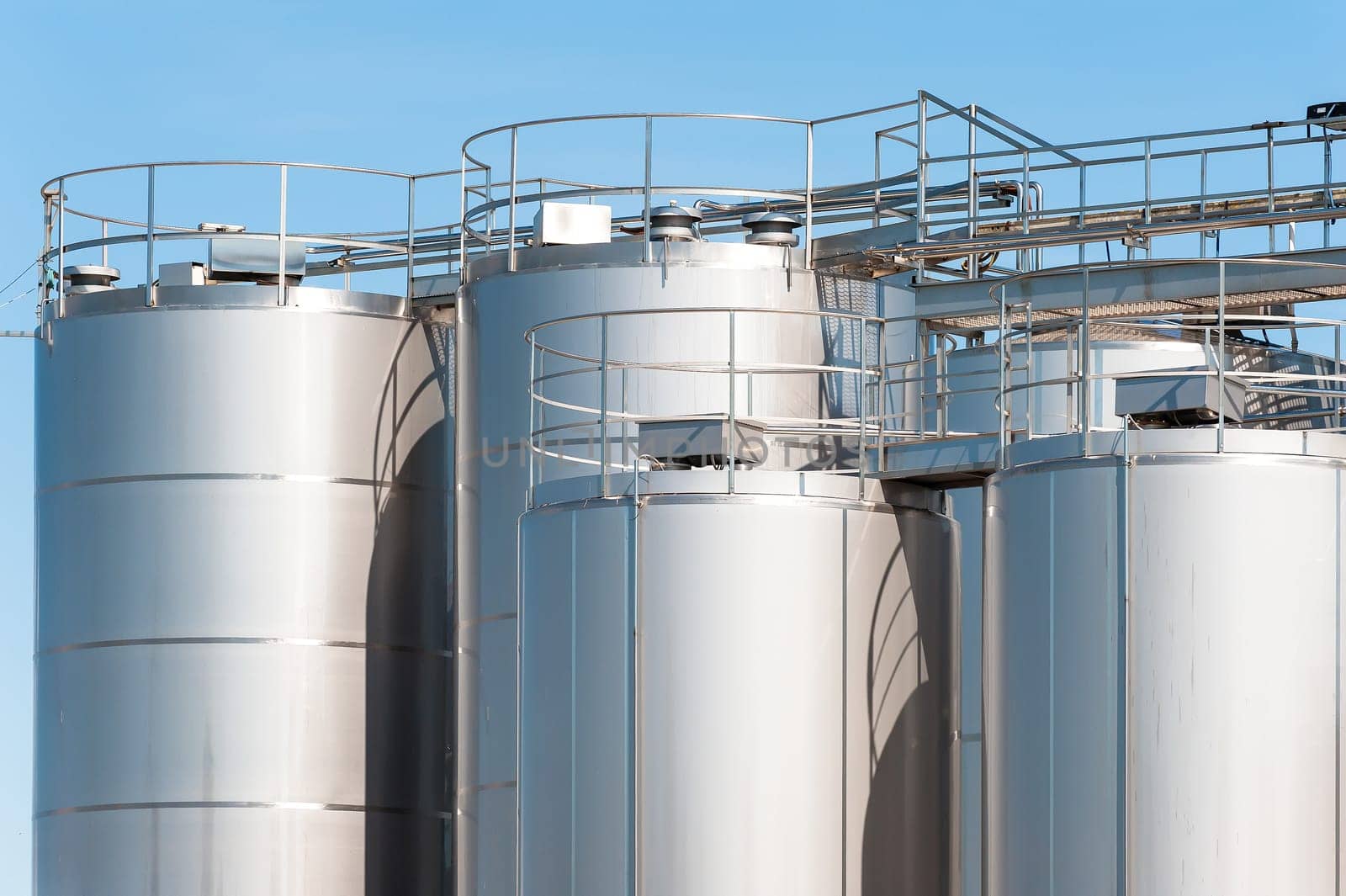 Stainless steel silos . For a milk processing plant.