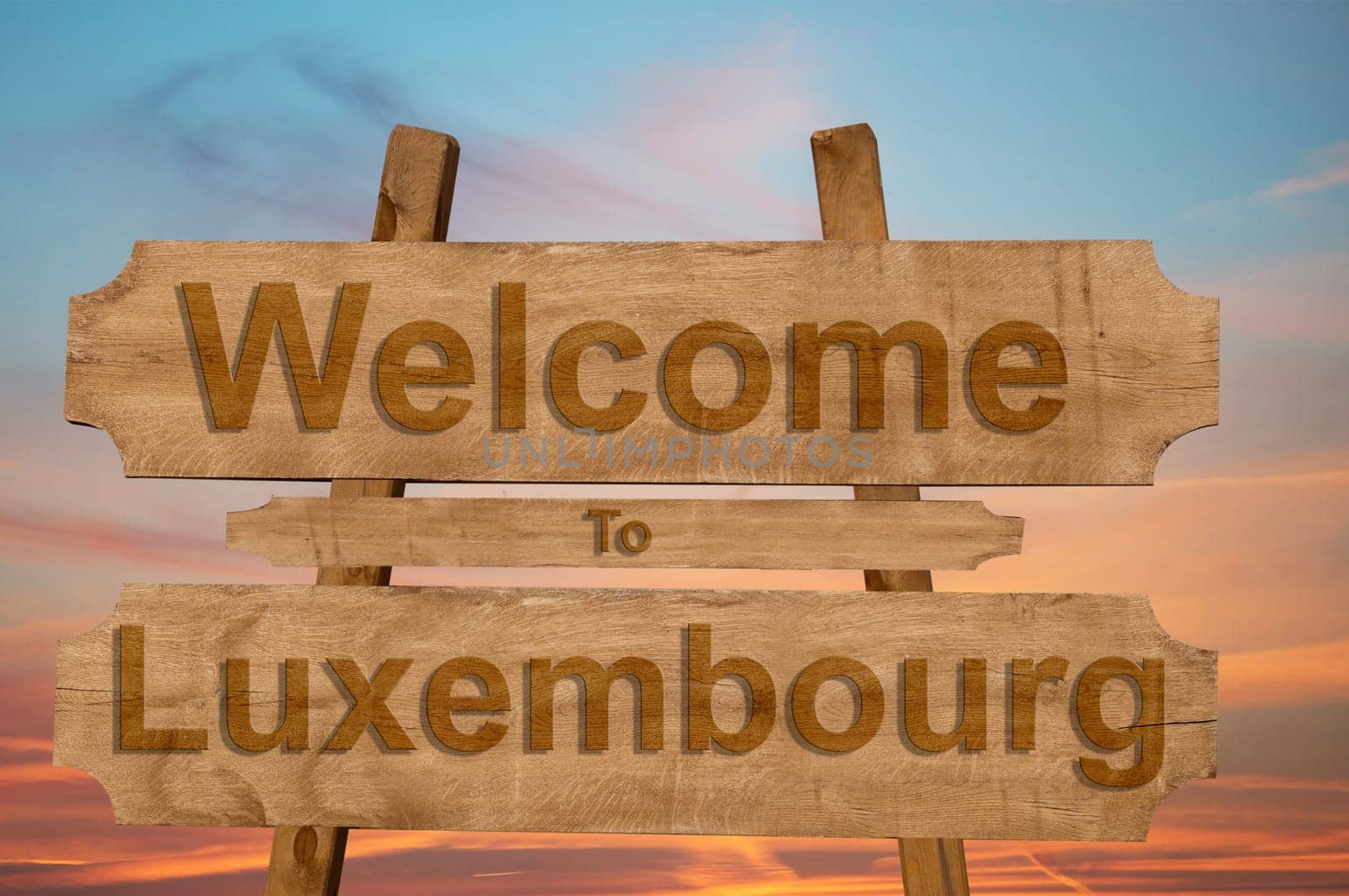 welcome to luxembourg sign on wood background