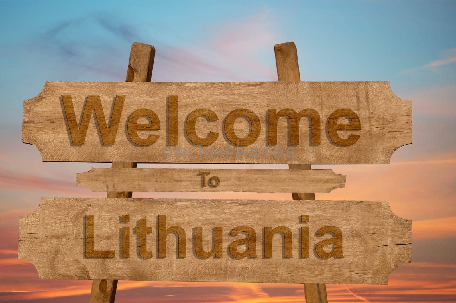 welcome to lithuania sign on wood background