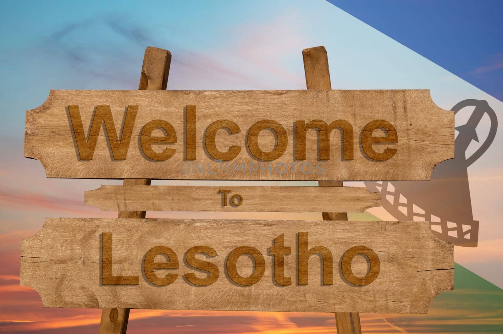 welcome to lesotho sign on wood background with blending national flag