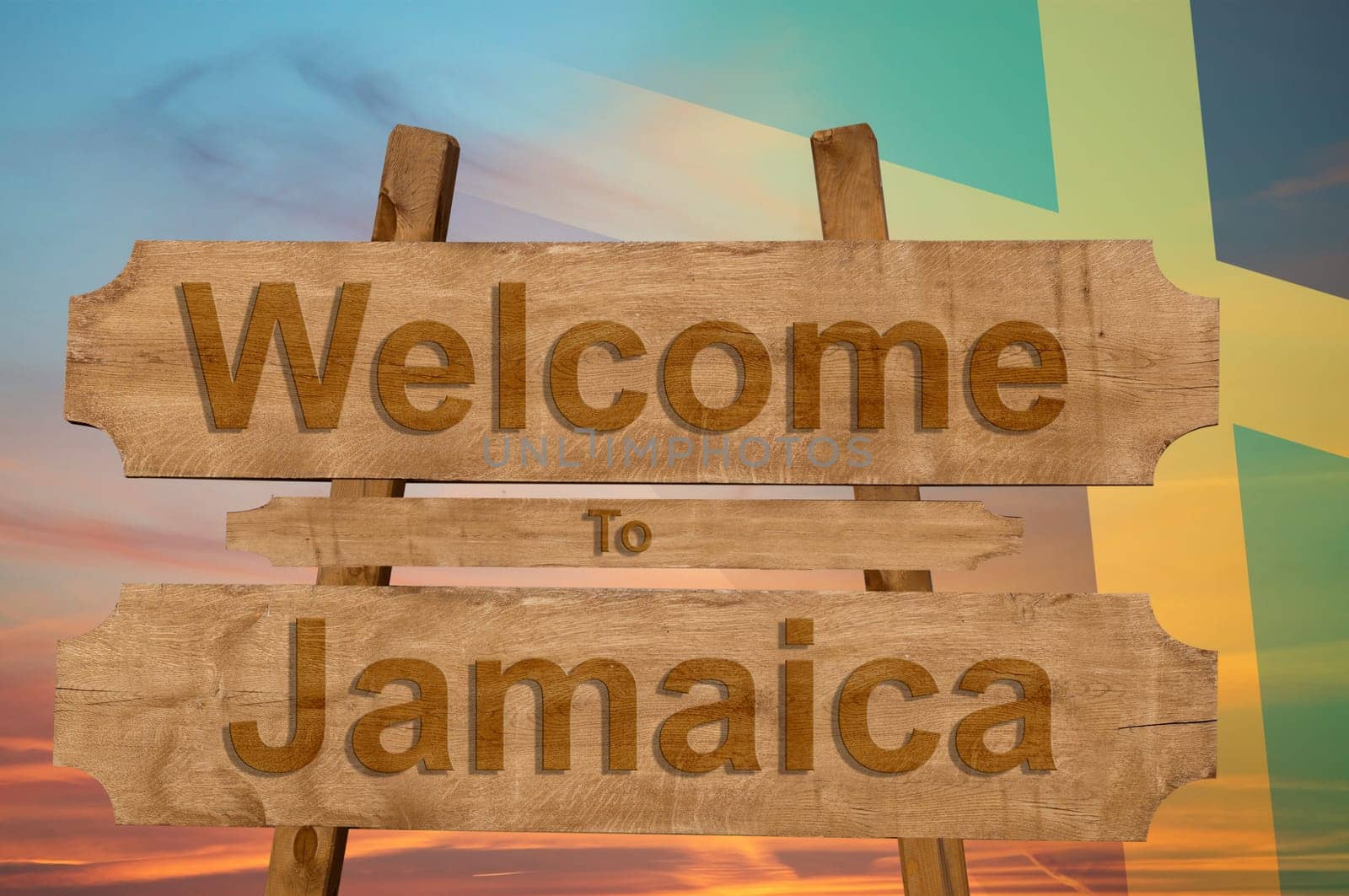 welcome to jamaica sign on wood background with blending national flag