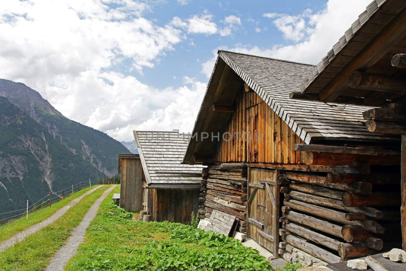 Old farmhouses in the mountains of Austria. Historic old houses and site