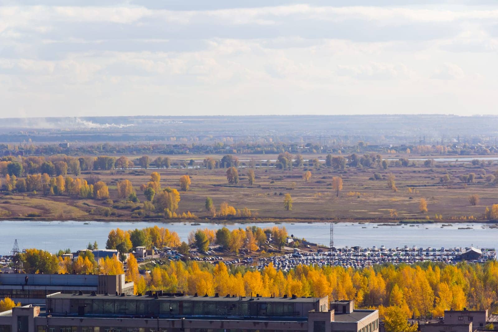 Panorama to calm river from bird flight