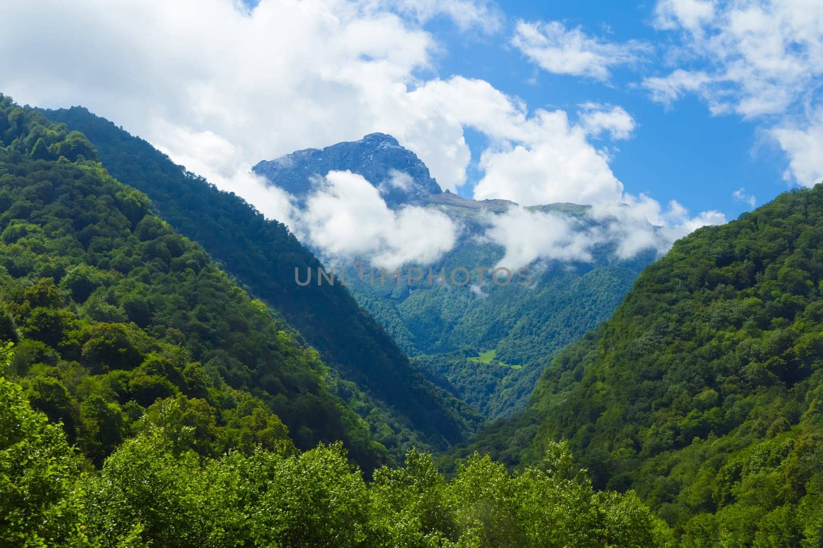 Summer landscape with Russian Caucasus green mountains