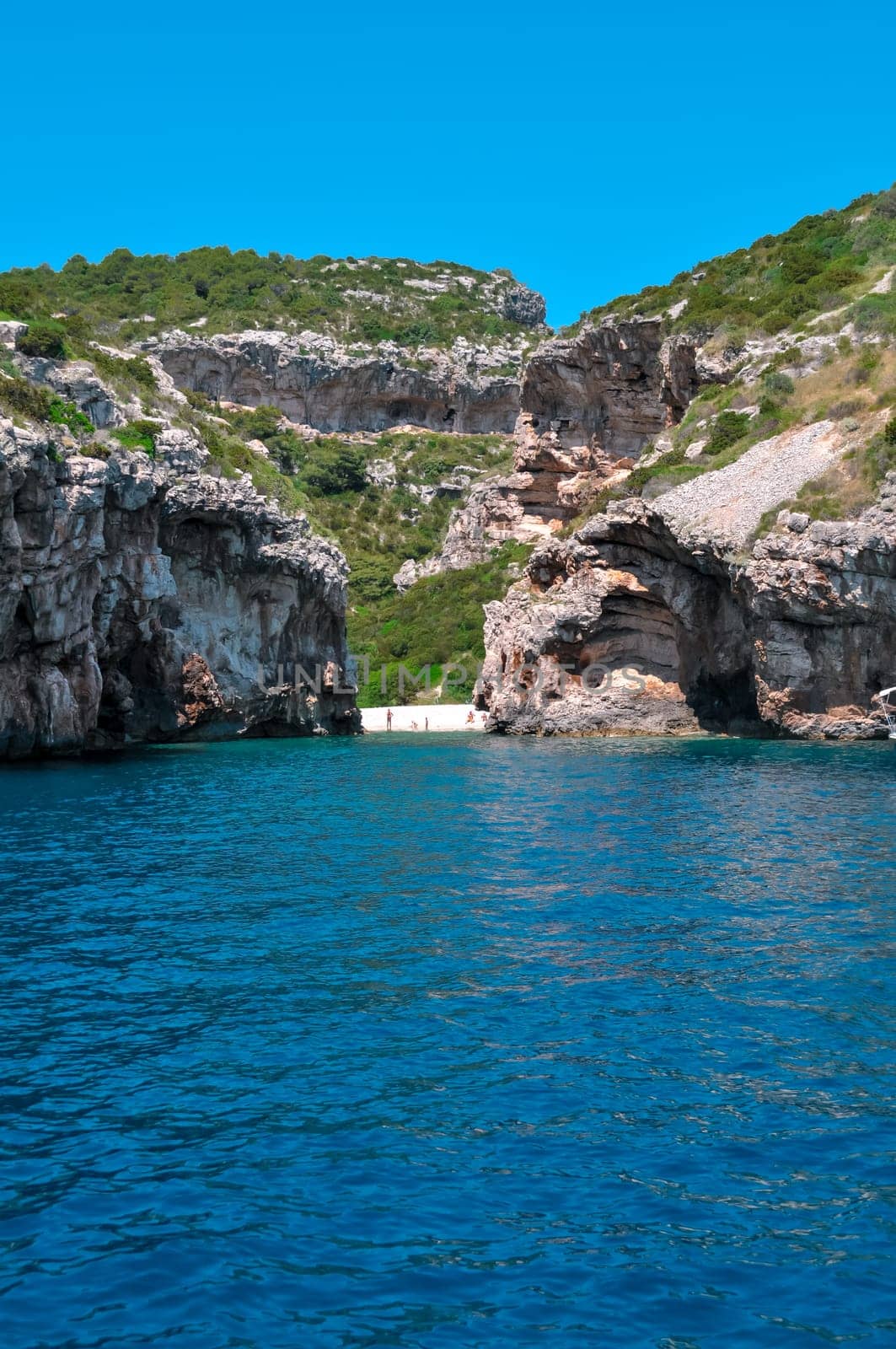 Sea view to small lagoon beach on mountains island