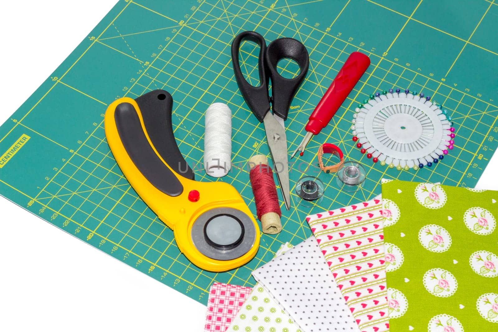 Hobby composition of patchwork instruments, items and fabrics