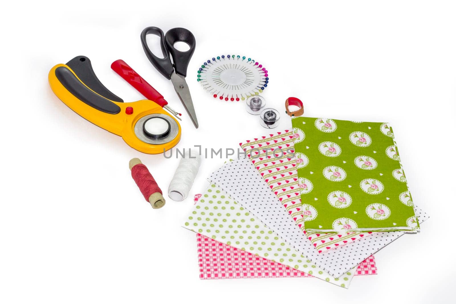 Composition of instruments, items and fabrics for patchwork hobby