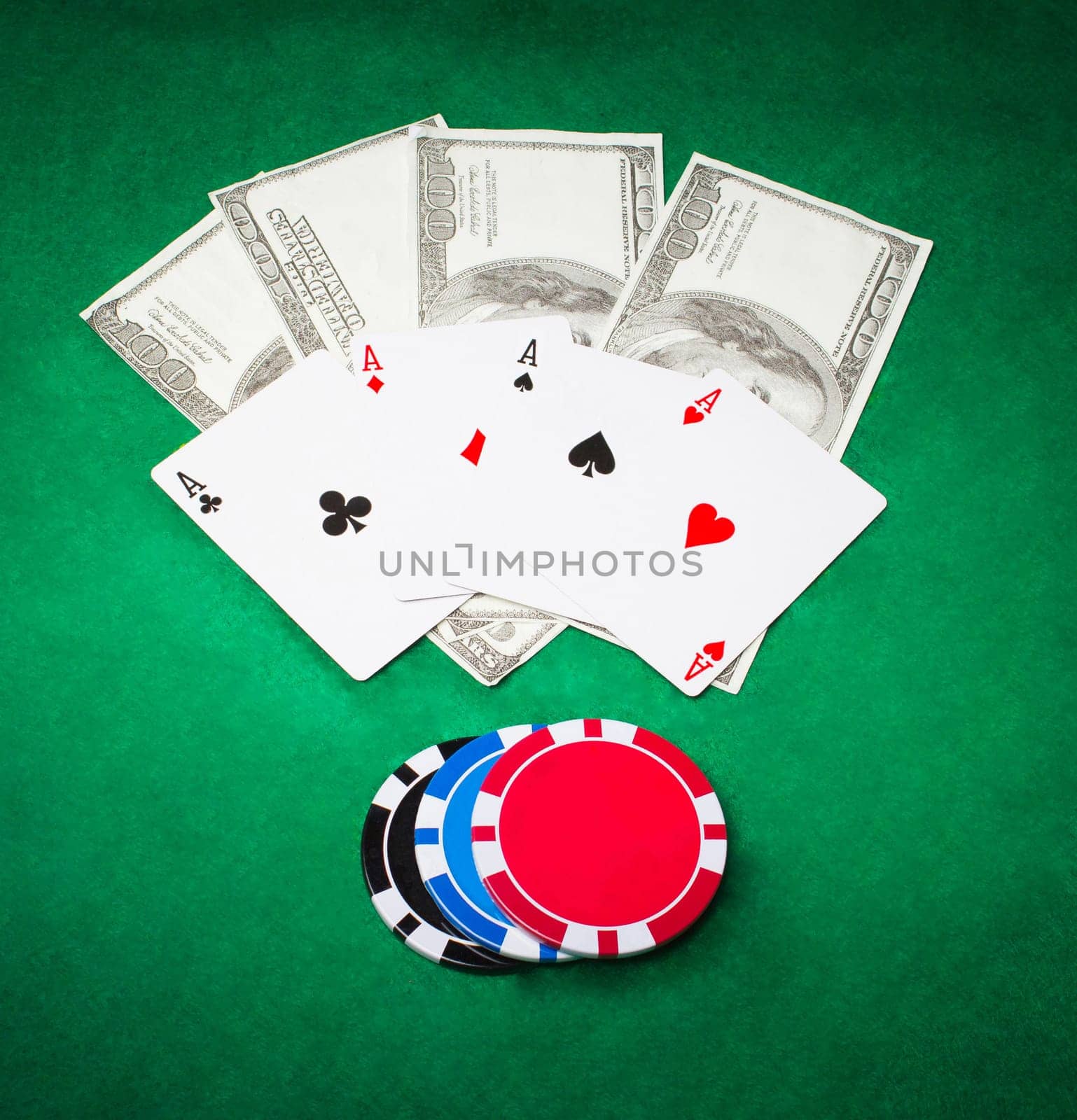 Poker cloth, a deck of cards and chips. Background.