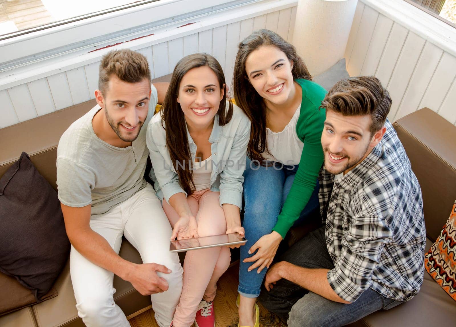 Group of friends meeting In the local Coffee Shop