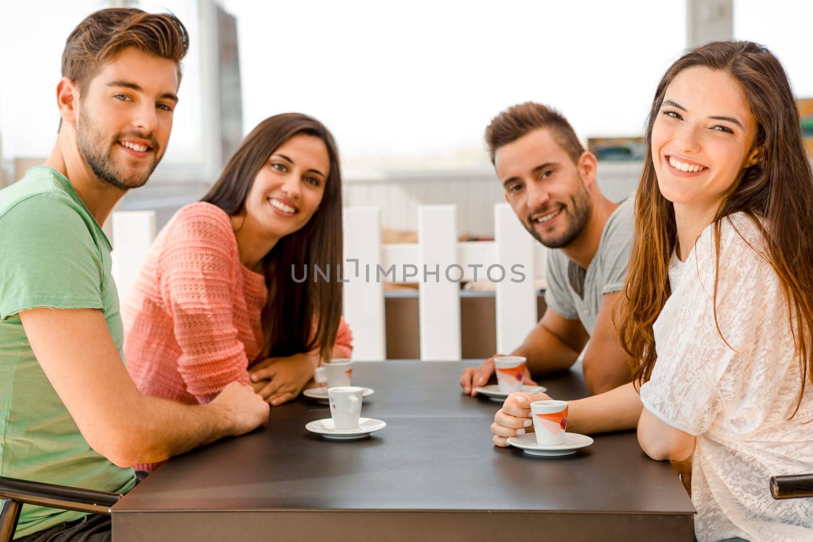 Friends having a great day at the local coffee shop