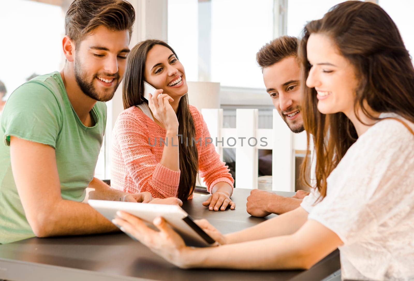 Group of friends meeting In the local Coffee Shop