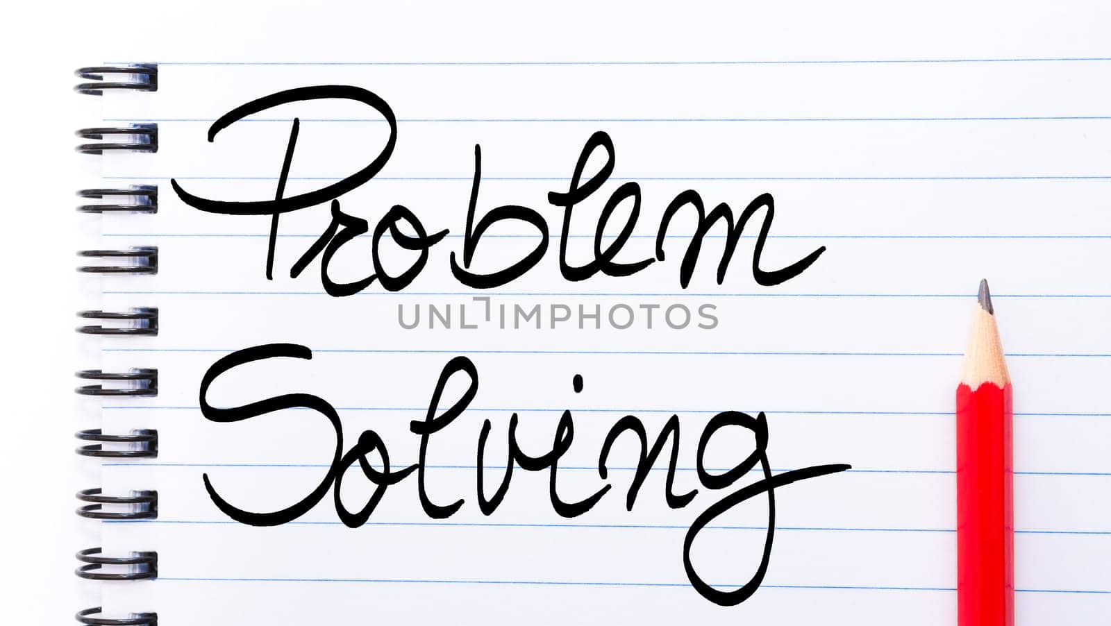 Problem Solving written on notebook page with red pencil on the right