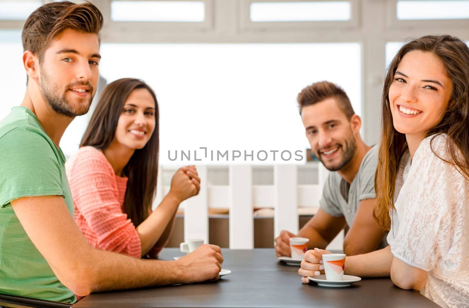 Friends having a great day at the local coffee shop