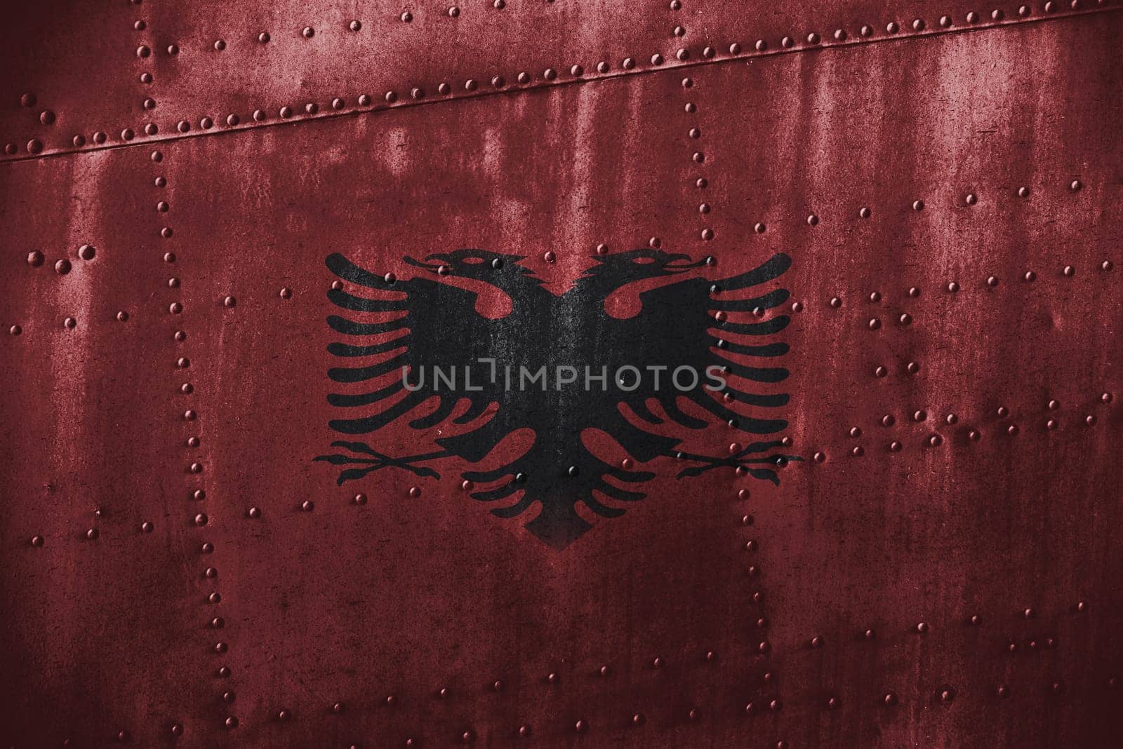 metal texutre or background with albania flag