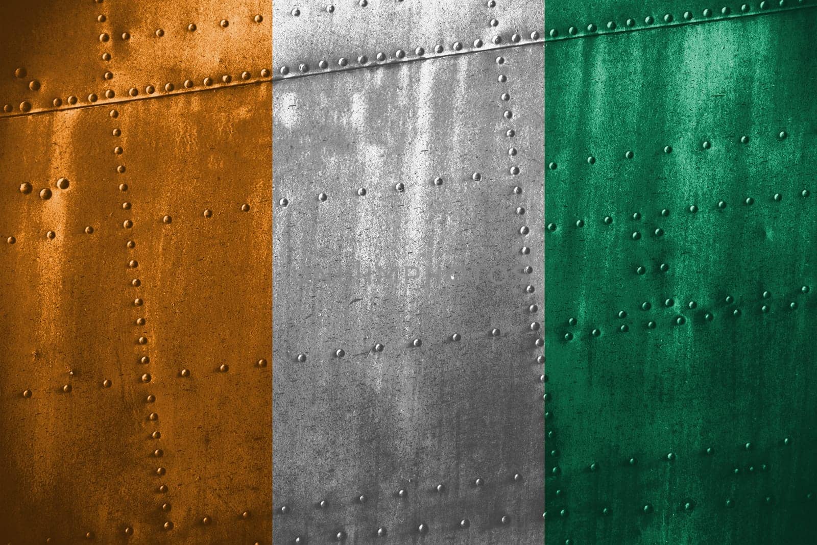 texutre or metal background with ivory coast flag
