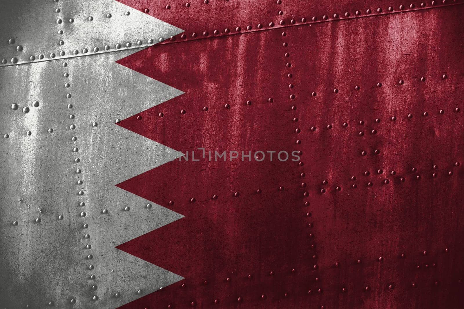 metal texutre or background with bahrain flag