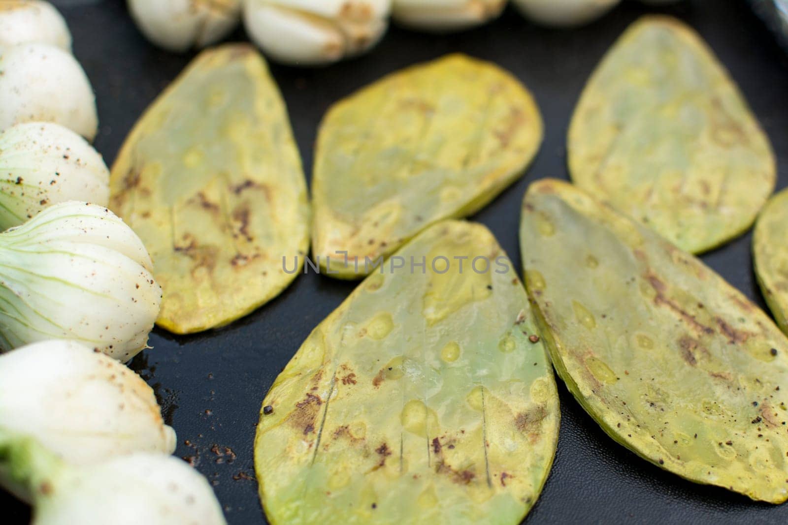 Cooking nopales and chambray onions