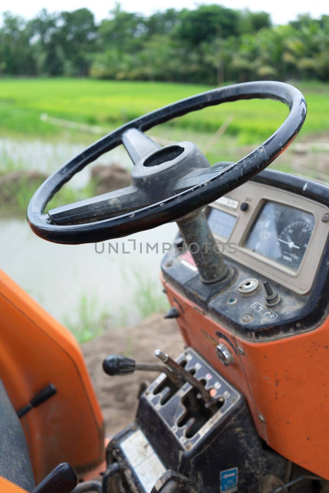 Tractor in a rice field