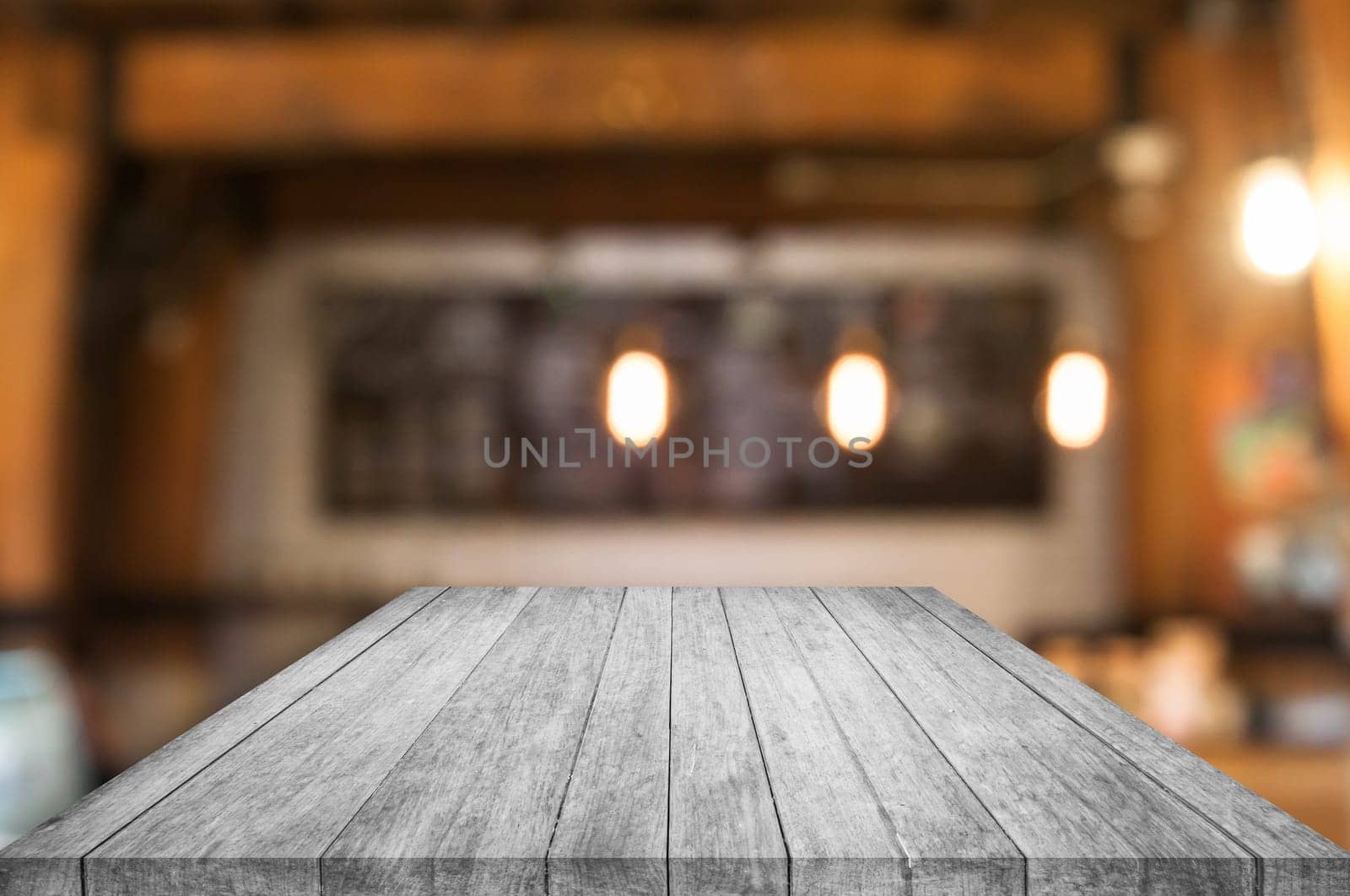Perspective black and white wooden table top with coffee shop blurred abstract background