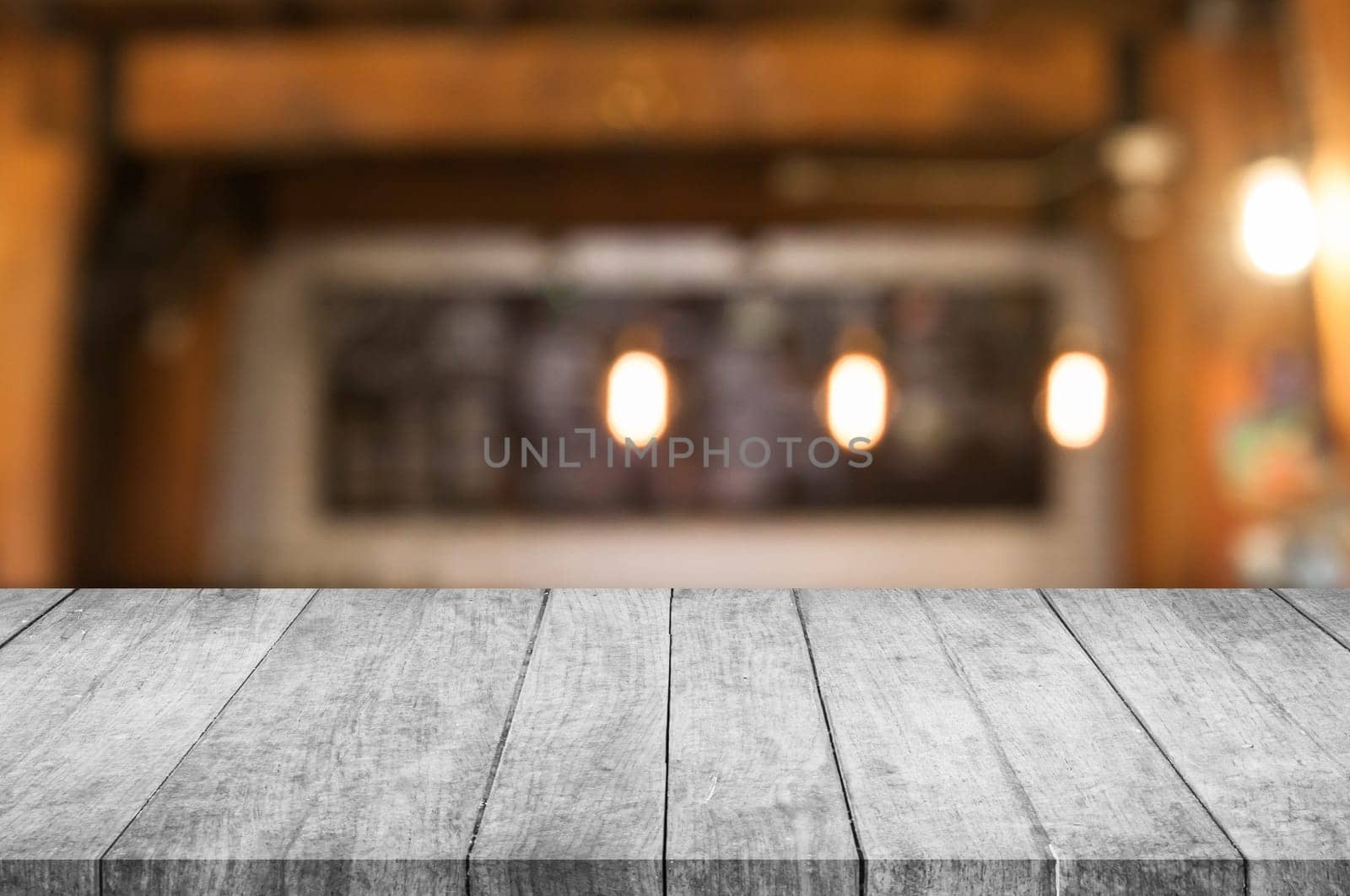 Black and white perspective wooden table top with coffee shop blurred abstract background