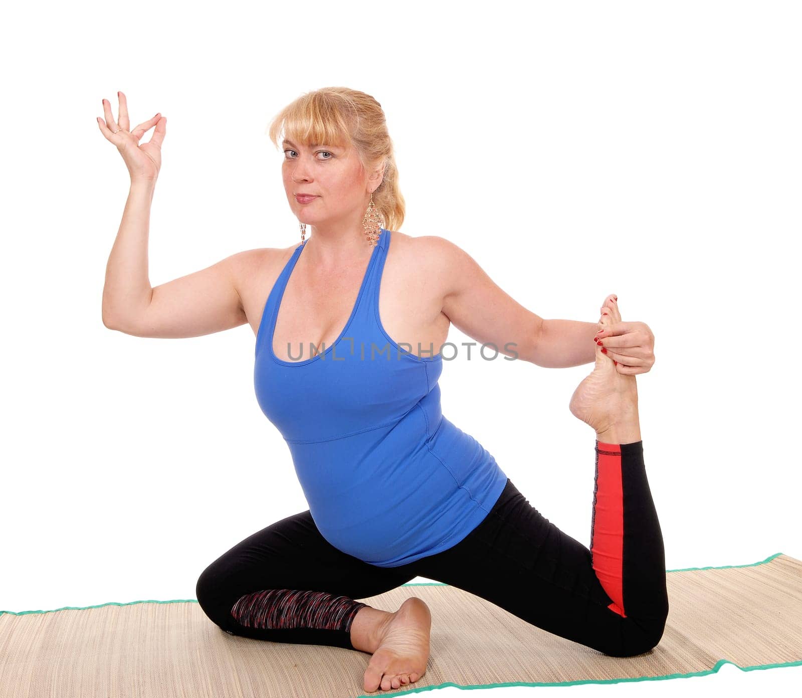 A lovely blond woman is yoga outfit showing some poses for yoga.exercises, isolated for white background..