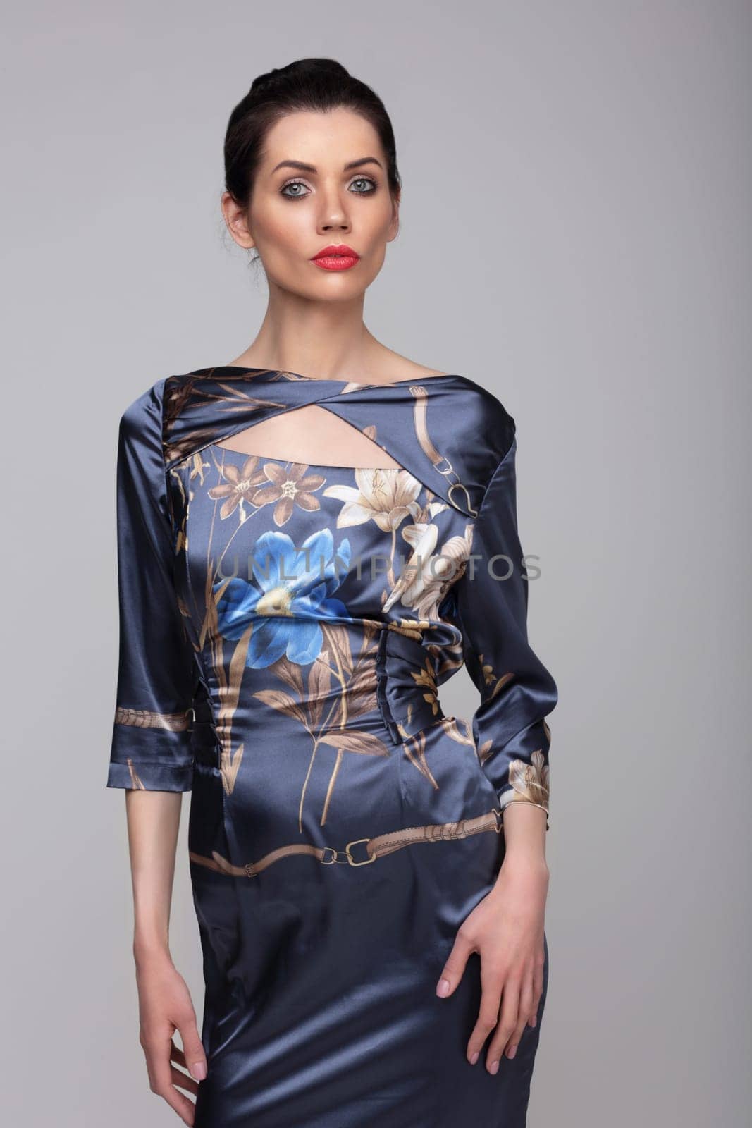 Beautiful confident woman in a dress.