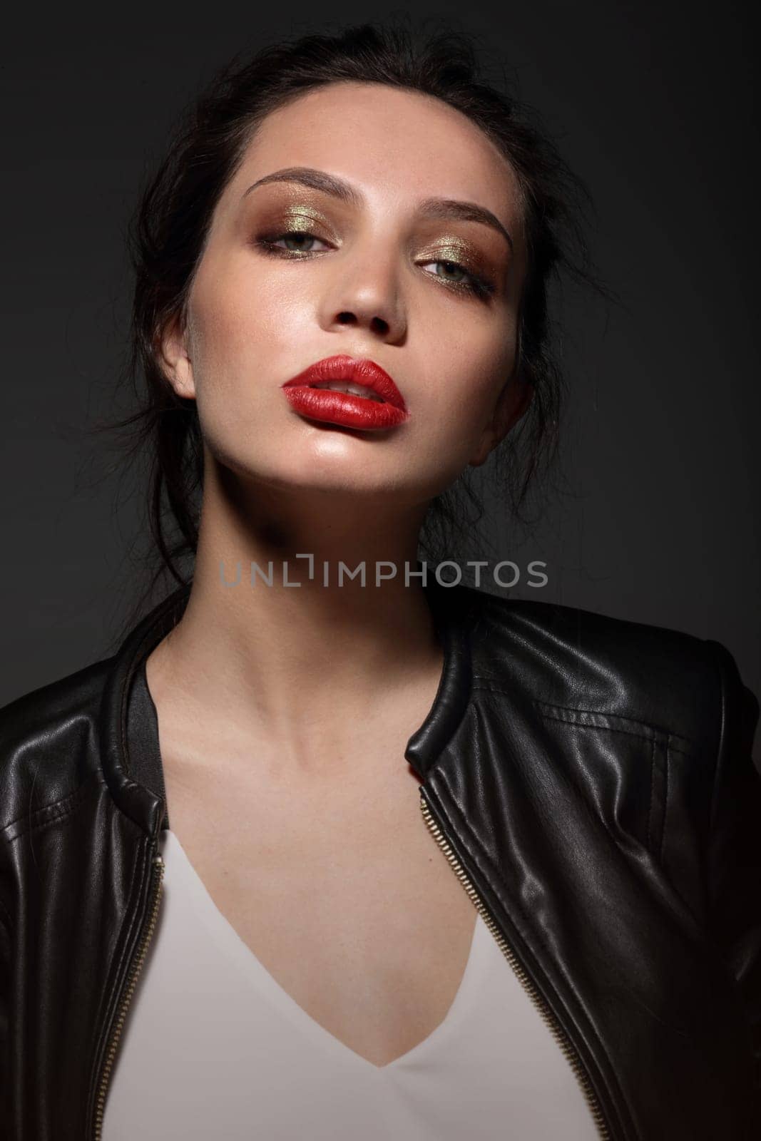 Portrait of beautiful girl with red lips. Fashion trend. Professional and stylish.