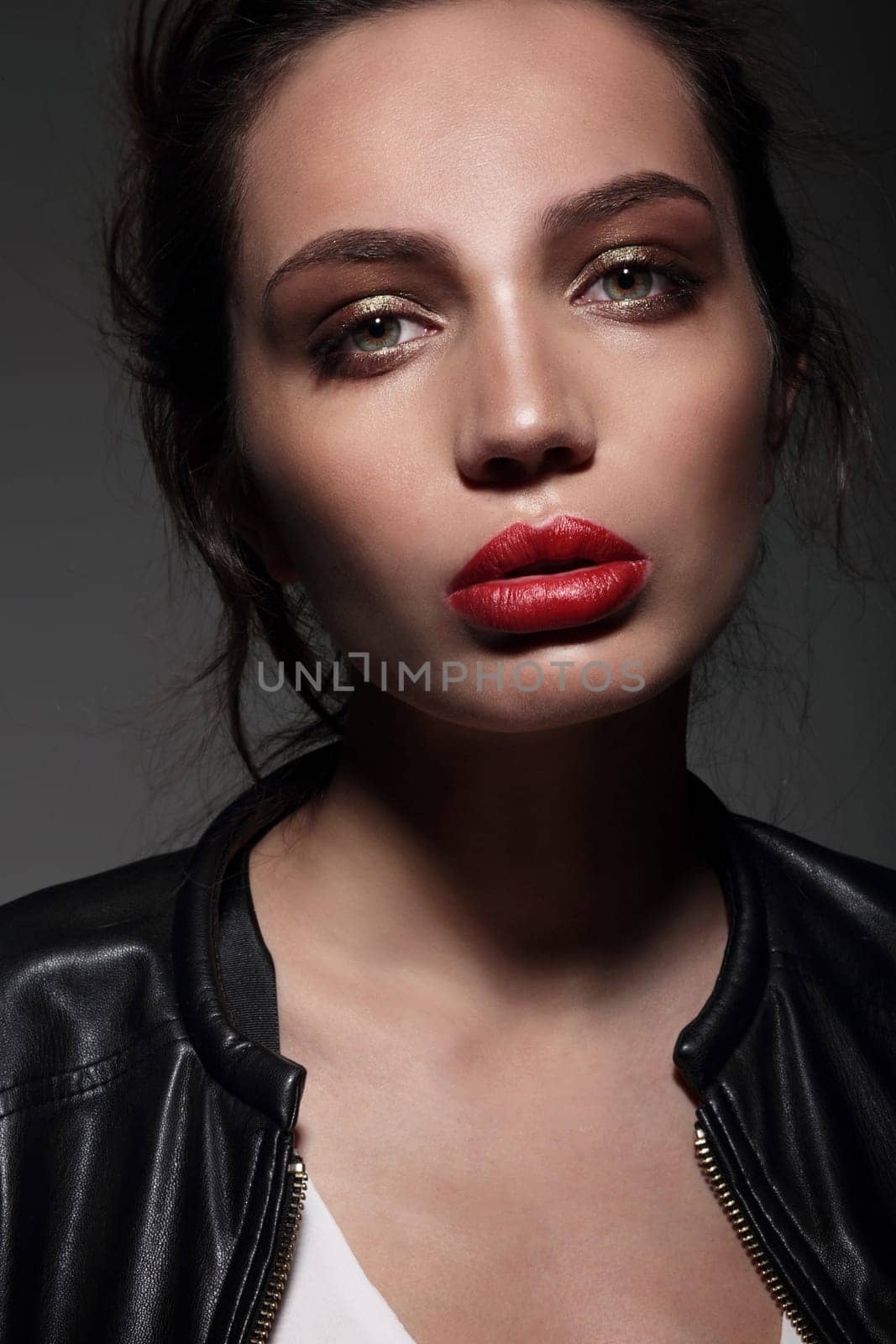 Sensual portrait of beautiful woman model lady with red lips and clean healthy skin face..