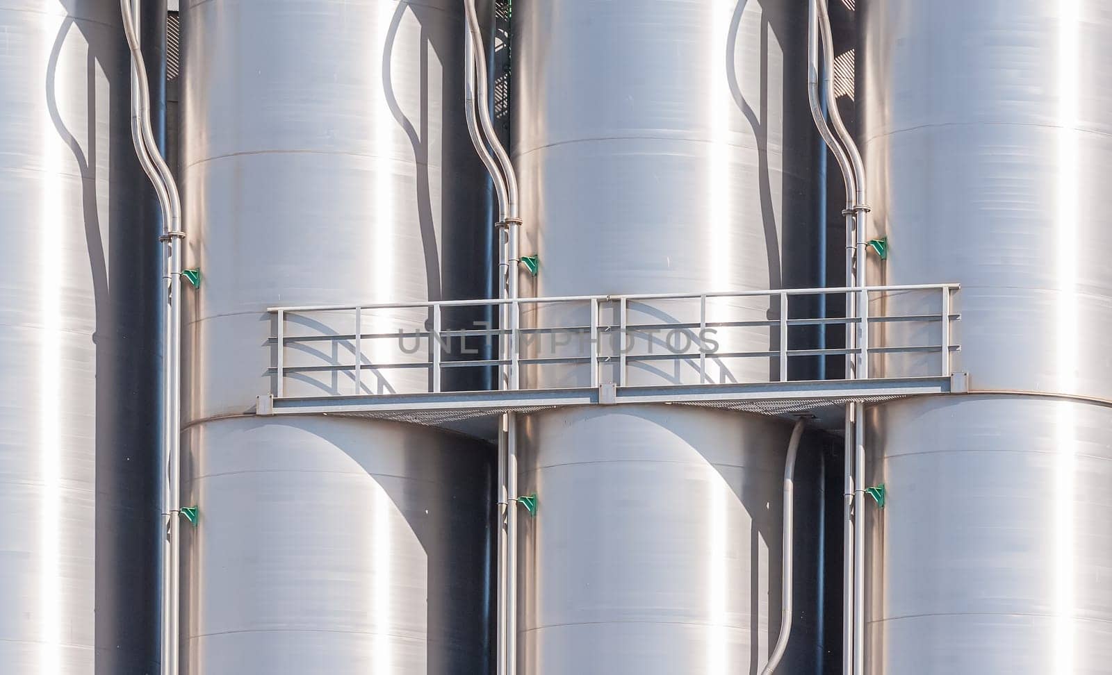 Detail of chemical plant, silos and pipes
