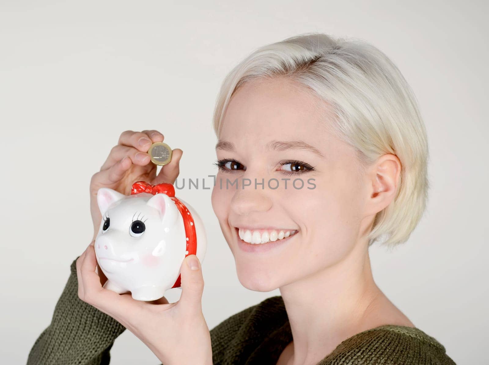 Woman with piggy bank