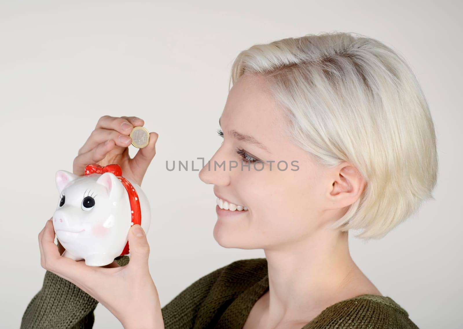 Woman with piggy bank