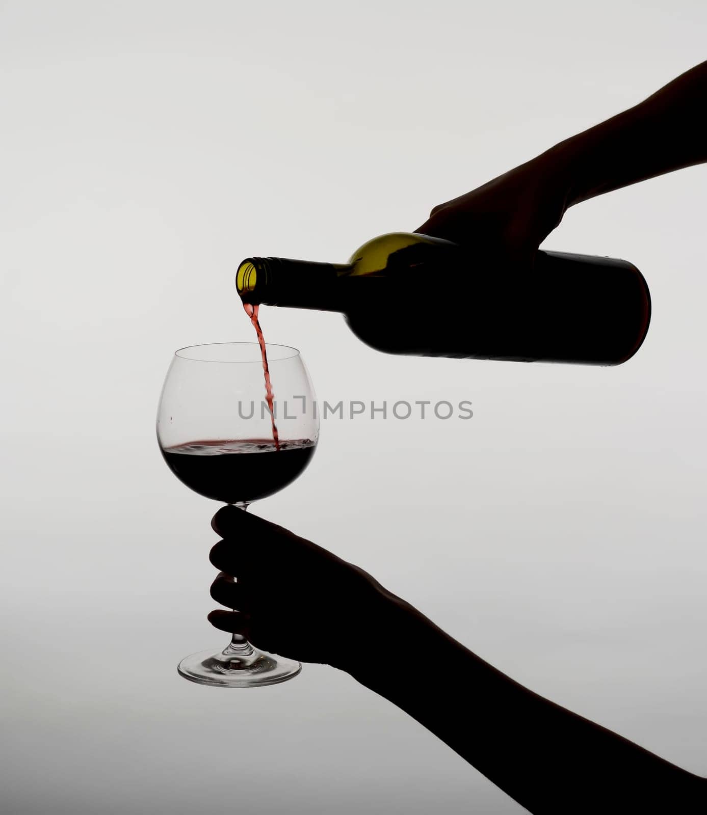Woman pours wine