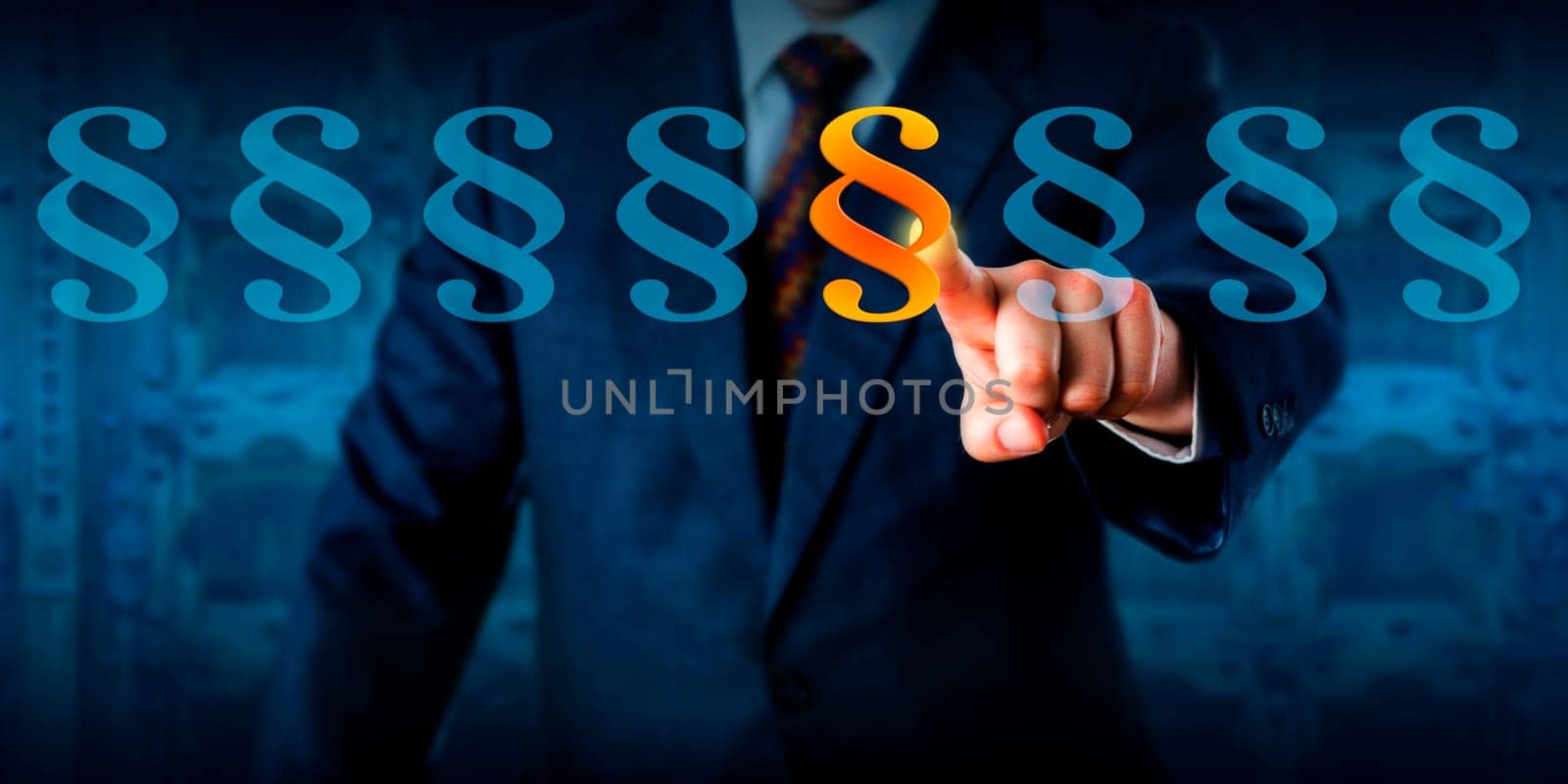 Male compliance and ethics professional is highlighting a paragraph sign in a lineup. Business concept and legal metaphor for regulatory compliance, corporate governance, criminal and civil law.