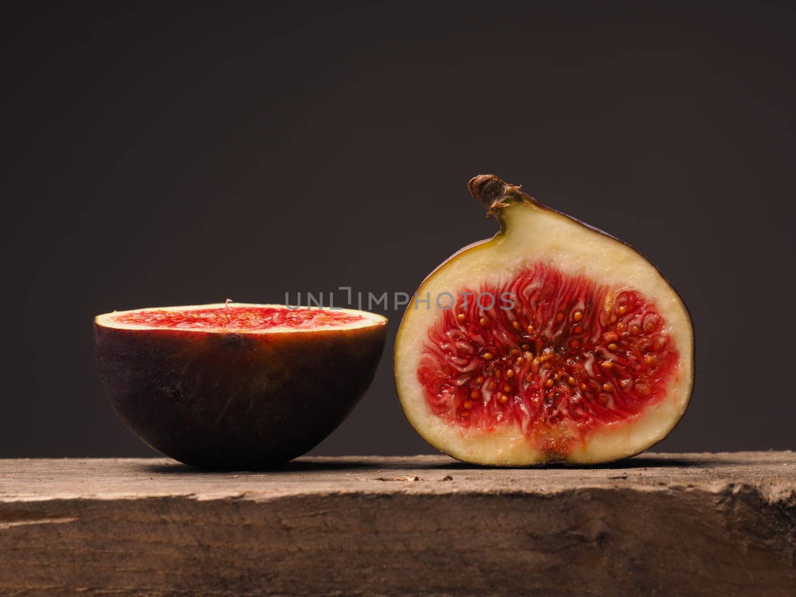 Fresh organic figs on a rustic wooden table