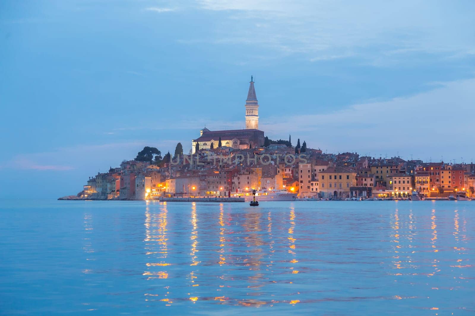 Coastal town of Rovinj, Istria, Croatia in sunset. Romantic Rovinj is a town in Croatia situated on the north Adriatic Sea Located on the western coast of the Istrian peninsula.