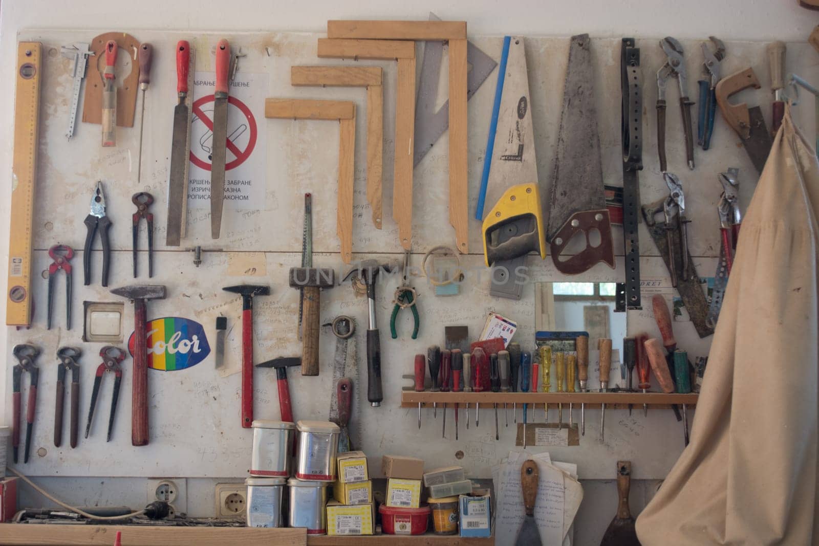 Shelves with tools in carpenters workshop