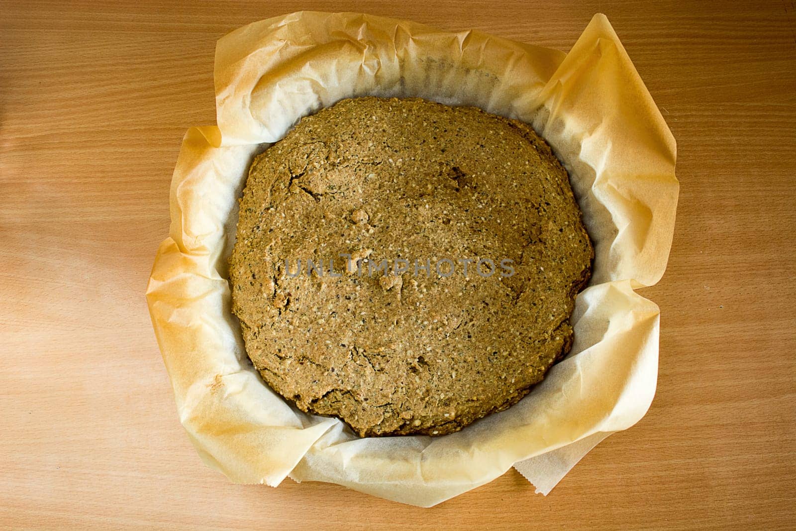 Just baked, fresh, domestic unleavened barley bread on the kitchen table