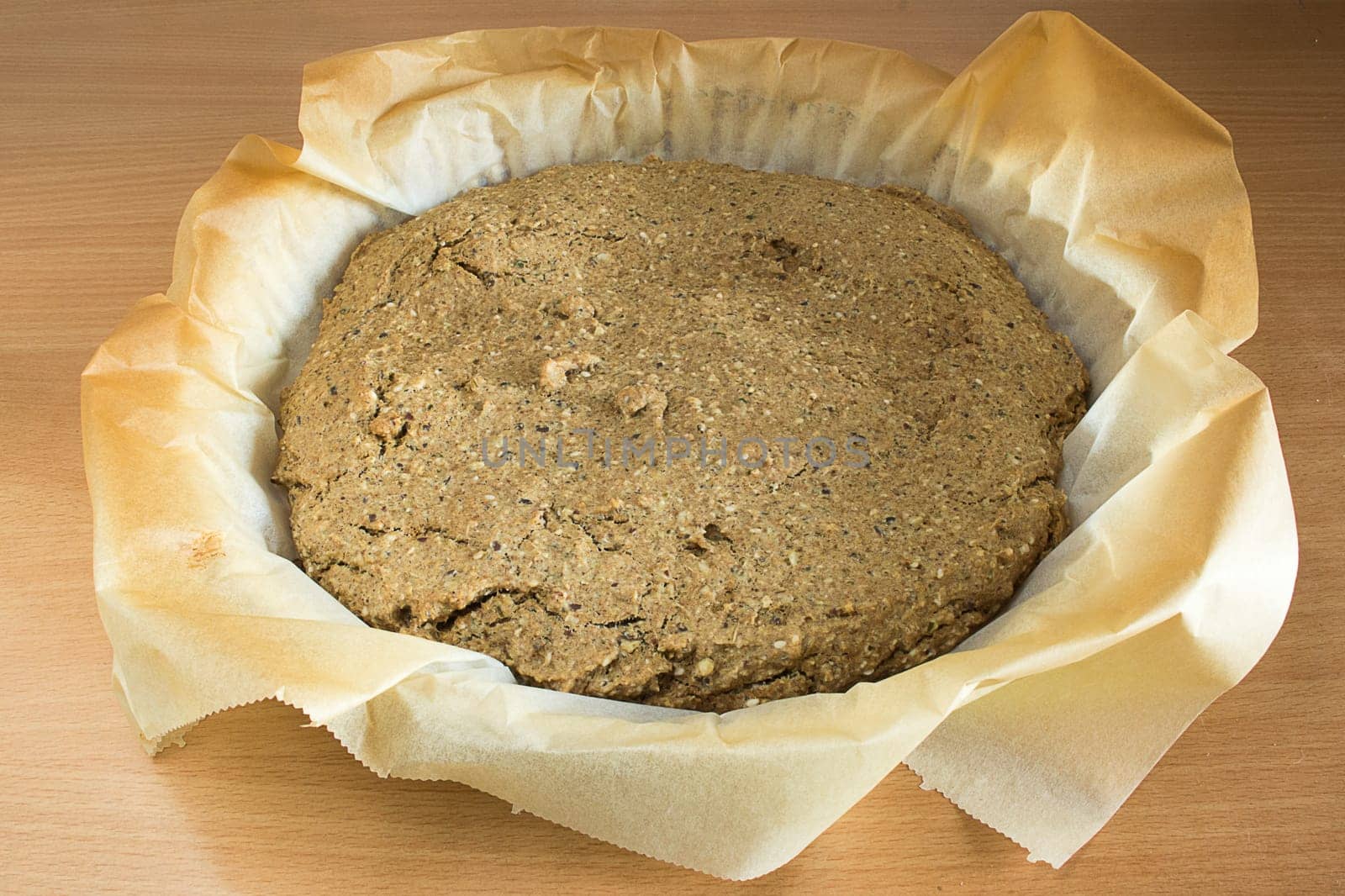 Just baked, fresh, domestic unleavened barley bread on the kitchen table